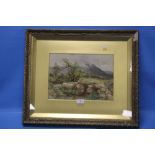 A FRAMED WATERCOLOUR DEPICTING A WELSH MOUNTAIN SCENE, 'DOLGELLY' WRITTEN ON REVERSE, SIGNED LOWER