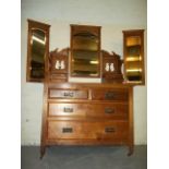 A TRIPLE MIRROR MAHOGANY DRESSING TABLE