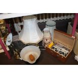 AN ENAMEL COOKING POT, TWO LAMPS ETC.