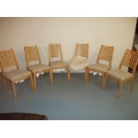 A SET OF SIX CALLIGARIS SOLID BEECH DINING CHAIRS