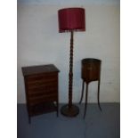 A RECORD MUSIC CABINET, A LAMP AND A PLANT STAND (3)