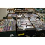 A LARGE QUANTITY OF CDS AND DVDS