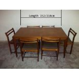 AN EXTENDING TEAK DINING TABLE AND SIX CHAIRS