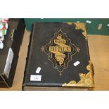 A HOLY BIBLE WITH ILLUSTRATIONS AND MAPS WITH CLASPS IN GOOD CONDITION