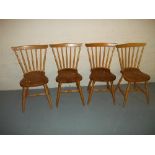 A SET OF FOUR SOLID PINE / BEECH KITCHEN CHAIRS