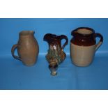 A COLLECTION OF ASSORTED JUGS TO INCLUDE A MINIATURE ROYAL DOULTON LAMBETH STYLE