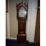 AN ANTIQUE GRANDFATHER CLOCK