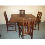 A DROP LEAF DINING TABLE AND FOUR CHAIRS, 1930S