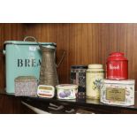 AN ENAMELLED BREAD BIN, TOGETHER WITH A COLLECTION OF VINTAGE TINS AND A JUG (9)
