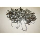A BAG OF DIAMANTE COSTUME JEWELLERY TO INCLUDE A QUANTITY OF NECKLACES