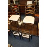 A LARGE OAK EXTENDING DINING TABLE & FOUR CHAIRS