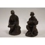 TWO BRONZE EFFECT FIGURES OF A HUNTSMAN AND A FISHERMAN Condition Report:No obvious damages or