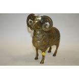 A LARGE BRASS FIGURE OF A RAM HEIGHT - 23.5 CM