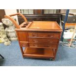 A COLONIAL HARDWOOD DRINKS TROLLEY W-81 CM