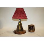 AN UNUSUAL BRASS ROCKET SHAPED TABLE LAMP MARKED T. W CHERUB, TOGETHER WITH A SMALL COPPER PORT LAMP