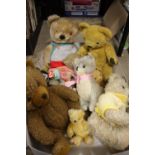 A BOX OF VINTAGE AND MODERN SOFT TOYS TO INCLUDE A STRAW FILLED CAT, MERRYTHOUGHT BEAR ETC.