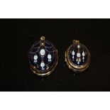 A MICHAELA FREY ENAMELLED PENDANT LOCKET TOGETHER WITH A LARGER UNMARKED EXAMPLE (2)