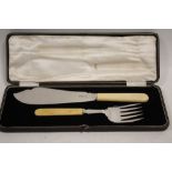 A CASED SET OF BONE HANDLED HALLMARKED SILVER FISH SERVERS