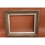 A 19TH CENTURY EGG ND DART DESIGN GILT PICTURE FRAME WITH GOLD SLIP - SLIP REBATE 56CM X 41CM