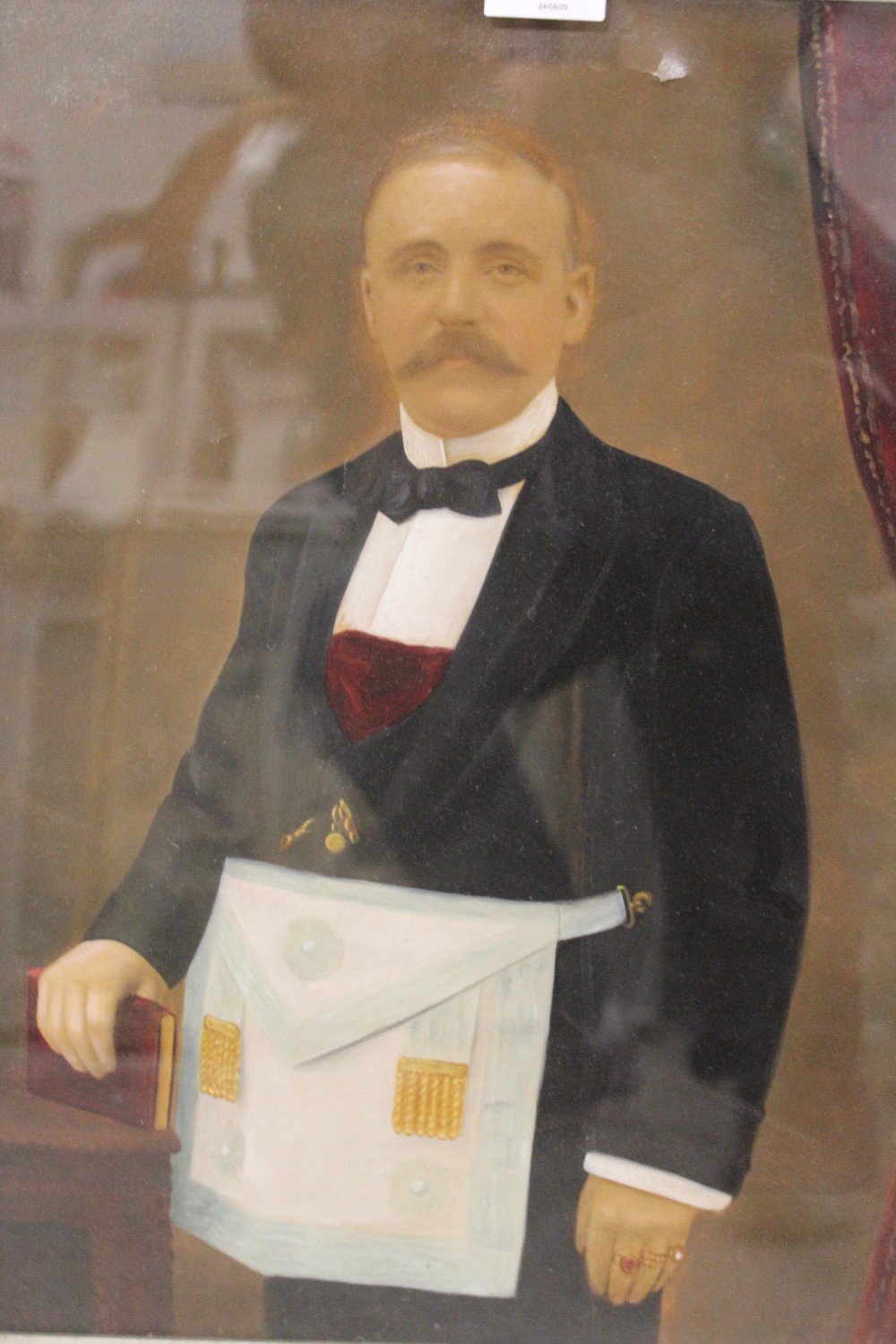 A FRAMED AND GLAZED OIL OVER PRINT OF A MASONIC GENTLEMAN