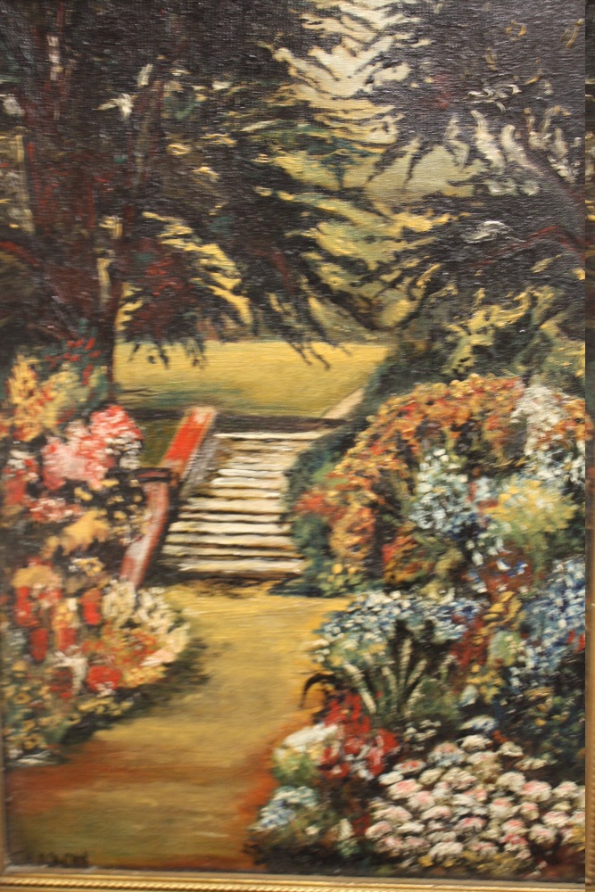 T HAXON - A GILT FRAMED OIL ON CANVAS OF A COUNTRY GARDEN SCENE 48.5CM X 39CM