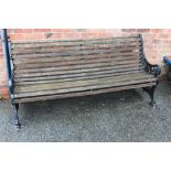 A LARGE GARDEN BENCH WITH CAST ENDS L-184 CM APPROX