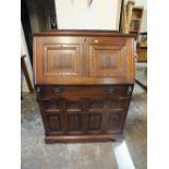 AN OLD CHARM OAK LINENFOLD COMPUTER BUREAU H-116 CM W-84 CM