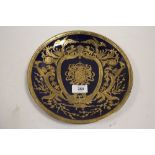 AN ORIENTAL STYLE NAVY BLUE AND GILT CABINET PLATE S/D