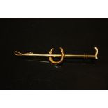 EQUESTRIAN INTEREST - A 9CT GOLD STOCK PIN, APPROX 1.7g