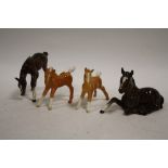 FOUR BESWICK FOAL FIGURES TO INCLUDE TWO PALOMINO EXAMPLES