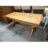 AN OAK TRESTLE TYPE COFFEE TABLE L-133 CM