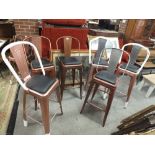 A MIXED SET OF SIX INDUSTRIAL STYLE METAL STOOLS WITH UPHOLSTERED SEATS