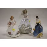 A LARGE ROYAL DOULTON REFLECTIONS 'FREE AS THE WIND' FIGURE, TOGETHER WITH TWO OTHER ROYAL DOULTON