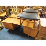 A RETRO TEAK CURVED DRESSING TABLE AND ROCKING STOOL W-153 CM