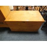 AN ANTIQUE PINE LOW BLANKET BOX H-48 CM W-91 CM