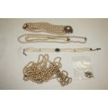 A COLLECTION OF PEARL AND FAUX PEARL NECKLACES TO INCLUDE A GEMSET EXAMPLE ON SILVER CLASP