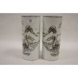 A PAIR OF ORIENTAL CERAMIC HAT STANDS / CYLINDRICAL VASES WITH HAND PAINTED MOUNTAINOUS LANDSCAPE