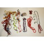 A COLLECTION OF GLASS BEAD NECKLACES ETC