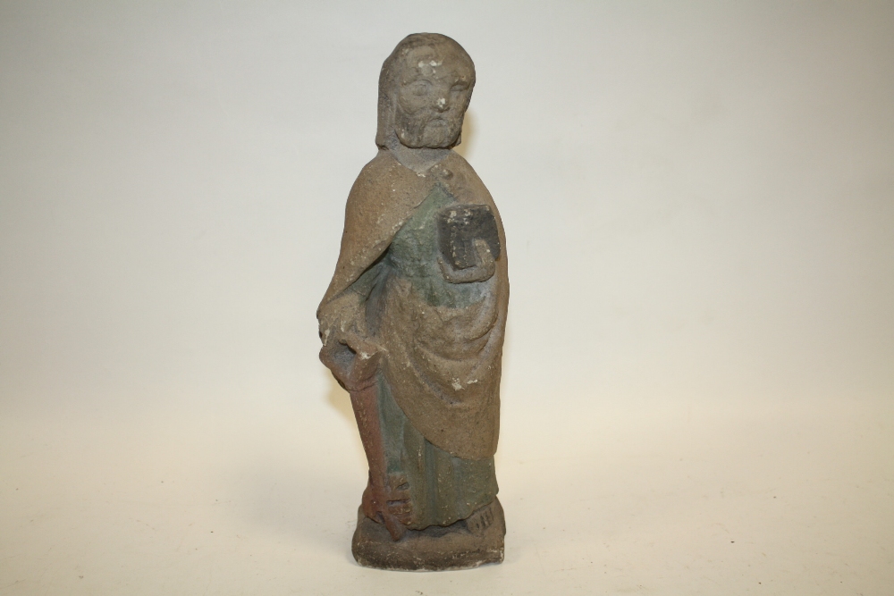 A SMALL RESIN SCULPTURE OF A 17TH CENTURY SAINT
