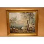 A GILT FRAMED ITALIAN STYLE CONTINENTAL COASTAL SCENE OIL ON CANVAS SIGNED LOWER LEFT SIZE - 59CM