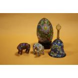 AN ORIENTAL/ CHINESE CLOISONNE BELL, TOGETHER WITH TWO SMALL CLOISONNE CATTLE FIGURES AND AN EGG