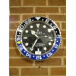 A MODERN REPRODUCTION ROLEX OYSTER PERPETUAL DATE WALL CLOCK