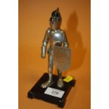 A NOVELTY TABLE LIGHTER IN THE FORM OF A KNIGHT
