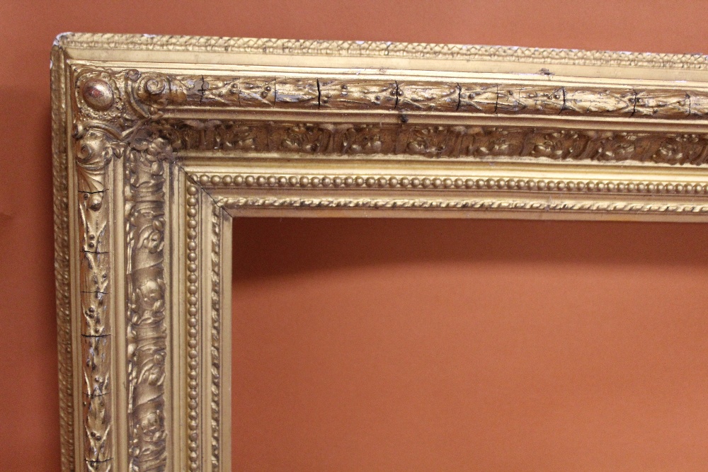 A 19TH CENTURY ACANTHUS LEAF DESIGN GILT PICTURE FRAME - REBATE 58CM X 68CM - Image 2 of 3