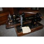 A CASED VINTAGE AUXILIARY SEWING MACHINE TOGETHER WITH A SINGER EXAMPLE (2)