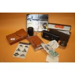 A VINTAGE POLAROID SX-70 LAND CAMERA TOGETHER WITH A ZEISS ICON EXAMPLE, CASED MEDICINE GLASS,