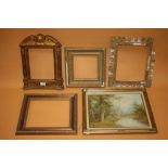 FOUR VINTAGE AND ANTIQUE PICTURE FRAMES, TOGETHER WITH A FRAMED OIL ON CANVAS OF A RIVER SCENE