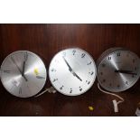 THREE SYNCHRONOME WALL CLOCKS