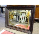 A VINTAGE PAINTED OAK FRAMED MIRROR TOGETHER WITH A FOLDER OF UNFRAMED PRINTS