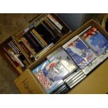 THREE BOXES OF DVDS